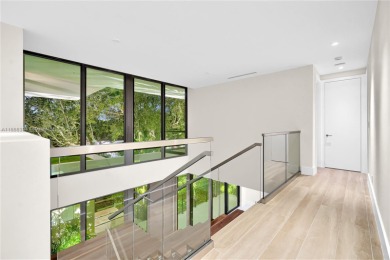 Experience Modern Elegance on the exclusive island of Key on Crandon Golf At Key Biscayne in Florida - for sale on GolfHomes.com, golf home, golf lot