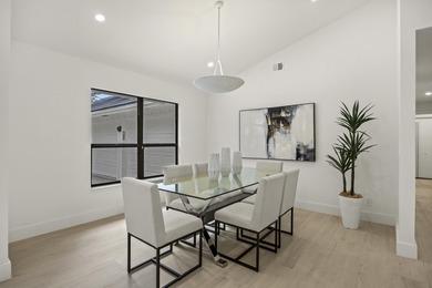 Discover refined luxury in this fully renovated 4,458 sq. ft on PGA National Golf Club in Florida - for sale on GolfHomes.com, golf home, golf lot