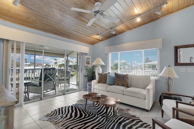 This exceptional waterfront residence in Key Colony Beach offers on Key Colony Beach Golf Course in Florida - for sale on GolfHomes.com, golf home, golf lot