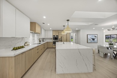 Discover refined luxury in this fully renovated 4,542 total sq on PGA National Golf Club in Florida - for sale on GolfHomes.com, golf home, golf lot