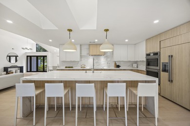 Discover refined luxury in this fully renovated 4,542 total sq on PGA National Golf Club in Florida - for sale on GolfHomes.com, golf home, golf lot