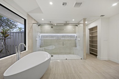 Discover refined luxury in this fully renovated 4,542 total sq on PGA National Golf Club in Florida - for sale on GolfHomes.com, golf home, golf lot