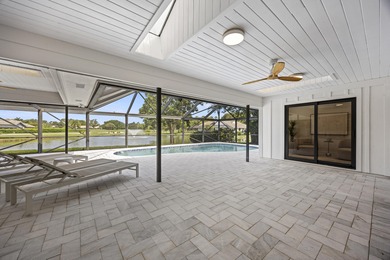 Discover refined luxury in this fully renovated 4,542 total sq on PGA National Golf Club in Florida - for sale on GolfHomes.com, golf home, golf lot
