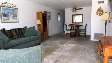 Great first floor fixer-upper opportunity! This 2 bedroom, 1 on On Top Of The World Golf Course in Florida - for sale on GolfHomes.com, golf home, golf lot