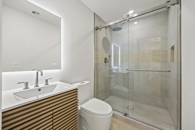 Discover refined luxury in this fully renovated 4,542 total sq on PGA National Golf Club in Florida - for sale on GolfHomes.com, golf home, golf lot