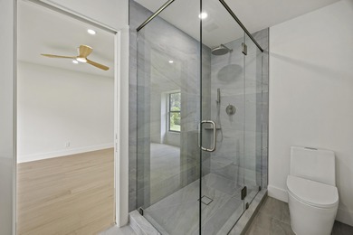 Discover refined luxury in this fully renovated 4,542 total sq on PGA National Golf Club in Florida - for sale on GolfHomes.com, golf home, golf lot