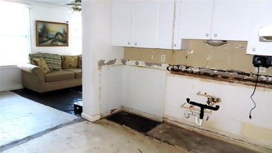 Great first floor fixer-upper opportunity! This 2 bedroom, 1 on On Top Of The World Golf Course in Florida - for sale on GolfHomes.com, golf home, golf lot
