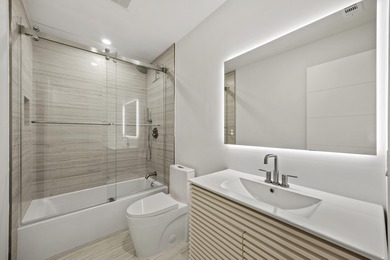 Discover refined luxury in this fully renovated 4,542 total sq on PGA National Golf Club in Florida - for sale on GolfHomes.com, golf home, golf lot