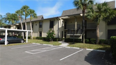 This second floor unit has upgraded luxury vinyl flooring on Vista Plantation Golf Club in Florida - for sale on GolfHomes.com, golf home, golf lot