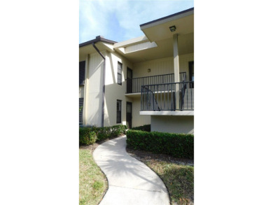 This second floor unit has upgraded luxury vinyl flooring on Vista Plantation Golf Club in Florida - for sale on GolfHomes.com, golf home, golf lot