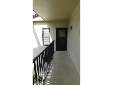 This second floor unit has upgraded luxury vinyl flooring on Vista Plantation Golf Club in Florida - for sale on GolfHomes.com, golf home, golf lot