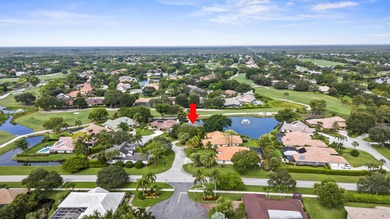 Discover refined luxury in this fully renovated 4,542 total sq on PGA National Golf Club in Florida - for sale on GolfHomes.com, golf home, golf lot