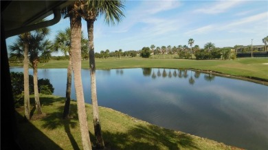 This second floor unit has upgraded luxury vinyl flooring on Vista Plantation Golf Club in Florida - for sale on GolfHomes.com, golf home, golf lot