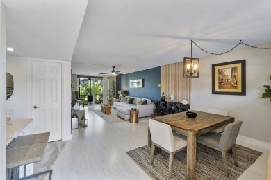 PHASE II - GORGEOUS FIRST FLOOR 1BR/1.5 BA UNIT. FULLY on Hollybrook Golf and Tennis Club  in Florida - for sale on GolfHomes.com, golf home, golf lot