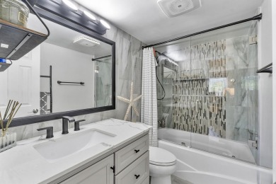 PHASE II - GORGEOUS FIRST FLOOR 1BR/1.5 BA UNIT. FULLY on Hollybrook Golf and Tennis Club  in Florida - for sale on GolfHomes.com, golf home, golf lot