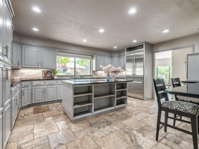Welcome to this stunning custom home with 5,488 sqft of living on Oak Tree National Golf and Country Club in Oklahoma - for sale on GolfHomes.com, golf home, golf lot