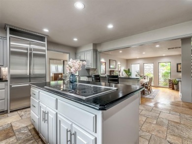Welcome to this stunning custom home with 5,488 sqft of living on Oak Tree National Golf and Country Club in Oklahoma - for sale on GolfHomes.com, golf home, golf lot