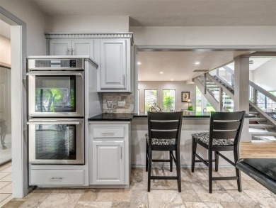 Welcome to this stunning custom home with 5,488 sqft of living on Oak Tree National Golf and Country Club in Oklahoma - for sale on GolfHomes.com, golf home, golf lot