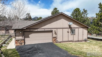 Tucked in the sought-after Mountain Golf Villas community, this on Estes Park Golf Course in Colorado - for sale on GolfHomes.com, golf home, golf lot