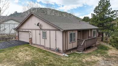 Tucked in the sought-after Mountain Golf Villas community, this on Estes Park Golf Course in Colorado - for sale on GolfHomes.com, golf home, golf lot