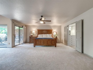 Welcome to this stunning custom home with 5,488 sqft of living on Oak Tree National Golf and Country Club in Oklahoma - for sale on GolfHomes.com, golf home, golf lot