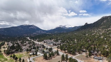 Tucked in the sought-after Mountain Golf Villas community, this on Estes Park Golf Course in Colorado - for sale on GolfHomes.com, golf home, golf lot