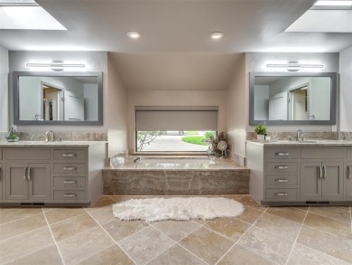 Welcome to this stunning custom home with 5,488 sqft of living on Oak Tree National Golf and Country Club in Oklahoma - for sale on GolfHomes.com, golf home, golf lot