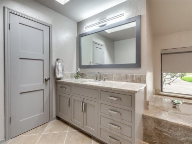 Welcome to this stunning custom home with 5,488 sqft of living on Oak Tree National Golf and Country Club in Oklahoma - for sale on GolfHomes.com, golf home, golf lot