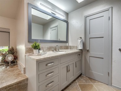 Welcome to this stunning custom home with 5,488 sqft of living on Oak Tree National Golf and Country Club in Oklahoma - for sale on GolfHomes.com, golf home, golf lot
