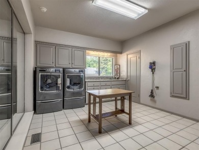 Welcome to this stunning custom home with 5,488 sqft of living on Oak Tree National Golf and Country Club in Oklahoma - for sale on GolfHomes.com, golf home, golf lot