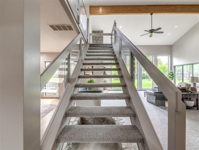 Welcome to this stunning custom home with 5,488 sqft of living on Oak Tree National Golf and Country Club in Oklahoma - for sale on GolfHomes.com, golf home, golf lot