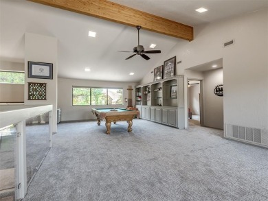 Welcome to this stunning custom home with 5,488 sqft of living on Oak Tree National Golf and Country Club in Oklahoma - for sale on GolfHomes.com, golf home, golf lot