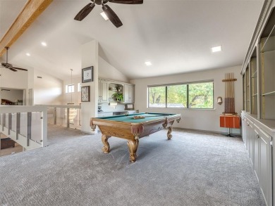 Welcome to this stunning custom home with 5,488 sqft of living on Oak Tree National Golf and Country Club in Oklahoma - for sale on GolfHomes.com, golf home, golf lot