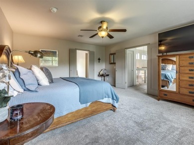 Welcome to this stunning custom home with 5,488 sqft of living on Oak Tree National Golf and Country Club in Oklahoma - for sale on GolfHomes.com, golf home, golf lot
