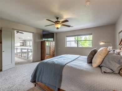 Welcome to this stunning custom home with 5,488 sqft of living on Oak Tree National Golf and Country Club in Oklahoma - for sale on GolfHomes.com, golf home, golf lot
