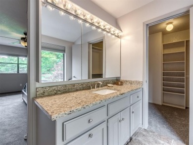 Welcome to this stunning custom home with 5,488 sqft of living on Oak Tree National Golf and Country Club in Oklahoma - for sale on GolfHomes.com, golf home, golf lot