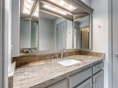 Welcome to this stunning custom home with 5,488 sqft of living on Oak Tree National Golf and Country Club in Oklahoma - for sale on GolfHomes.com, golf home, golf lot