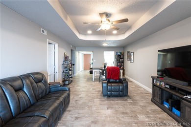 Completely remodeled and ideally located in the heart of Lake of on Seasons Ridge At Four Seasons in Missouri - for sale on GolfHomes.com, golf home, golf lot