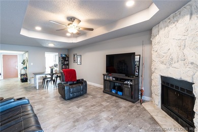 Completely remodeled and ideally located in the heart of Lake of on Seasons Ridge At Four Seasons in Missouri - for sale on GolfHomes.com, golf home, golf lot