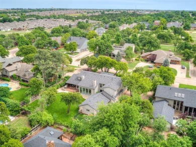 Welcome to this stunning custom home with 5,488 sqft of living on Oak Tree National Golf and Country Club in Oklahoma - for sale on GolfHomes.com, golf home, golf lot