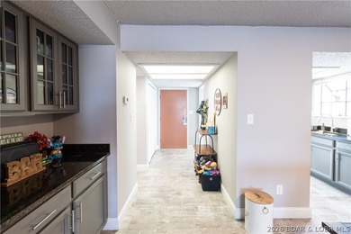 Completely remodeled and ideally located in the heart of Lake of on Seasons Ridge At Four Seasons in Missouri - for sale on GolfHomes.com, golf home, golf lot