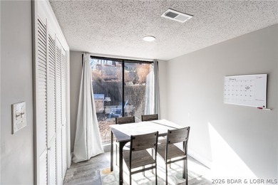 Completely remodeled and ideally located in the heart of Lake of on Seasons Ridge At Four Seasons in Missouri - for sale on GolfHomes.com, golf home, golf lot