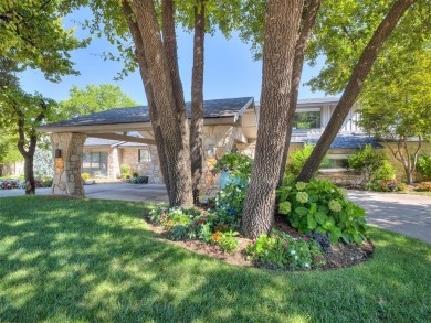 Welcome to this stunning custom home with 5,488 sqft of living on Oak Tree National Golf and Country Club in Oklahoma - for sale on GolfHomes.com, golf home, golf lot