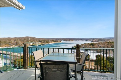 Top-floor 2BR, 2BA condo in the gated Cedar Heights overlooking on The Club At Old Kinderhook in Missouri - for sale on GolfHomes.com, golf home, golf lot