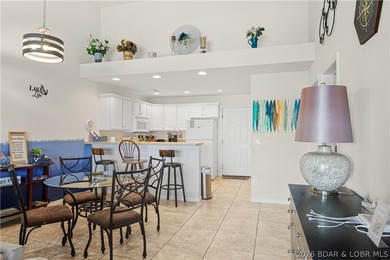 Top-floor 2BR, 2BA condo in the gated Cedar Heights overlooking on The Club At Old Kinderhook in Missouri - for sale on GolfHomes.com, golf home, golf lot