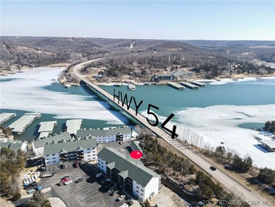 Top-floor 2BR, 2BA condo in the gated Cedar Heights overlooking on The Club At Old Kinderhook in Missouri - for sale on GolfHomes.com, golf home, golf lot