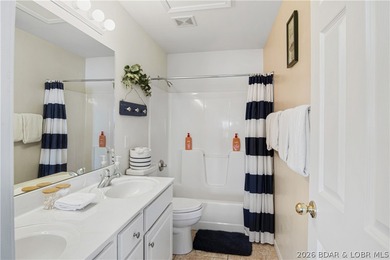 Top-floor 2BR, 2BA condo in the gated Cedar Heights overlooking on The Club At Old Kinderhook in Missouri - for sale on GolfHomes.com, golf home, golf lot