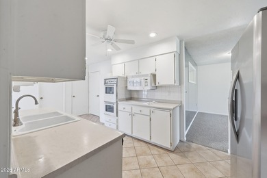 Beautiful golf course view. Charming Gemini home on the Sun City on Sun City Country Club in Arizona - for sale on GolfHomes.com, golf home, golf lot