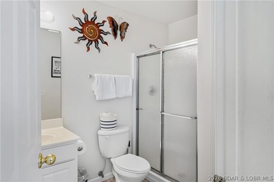 Top-floor 2BR, 2BA condo in the gated Cedar Heights overlooking on The Club At Old Kinderhook in Missouri - for sale on GolfHomes.com, golf home, golf lot