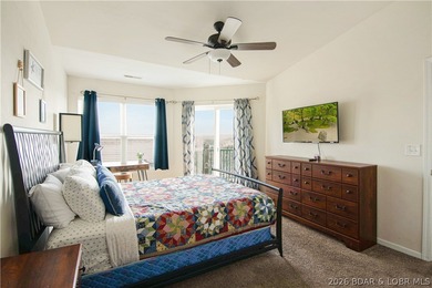 Top-floor 2BR, 2BA condo in the gated Cedar Heights overlooking on The Club At Old Kinderhook in Missouri - for sale on GolfHomes.com, golf home, golf lot